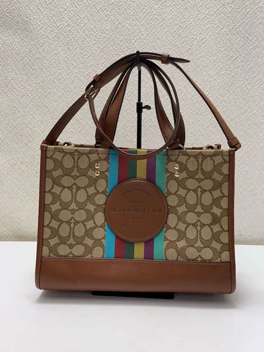 COACH Dempsey Carryall_Signature_With Strap and COACH Patch Canvas BRW