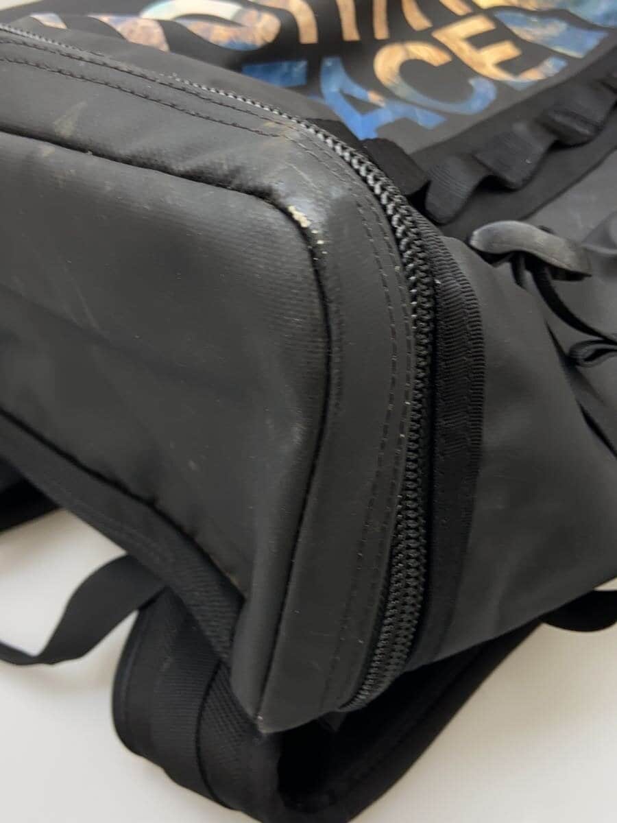 THE NORTH FACE backpack -- BLK all-over pattern NM81939 has damage 9