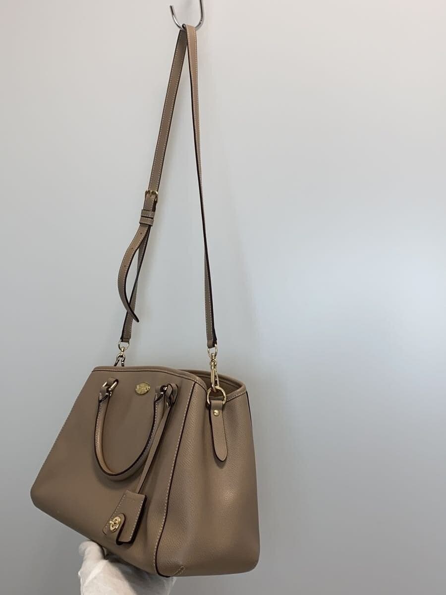 COACH handbag -- BEG There are stains on the bottom 2