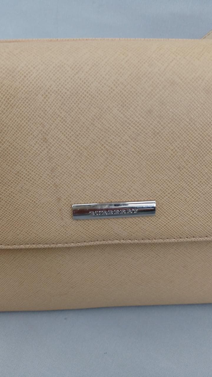 One-shoulder bag with stains 8