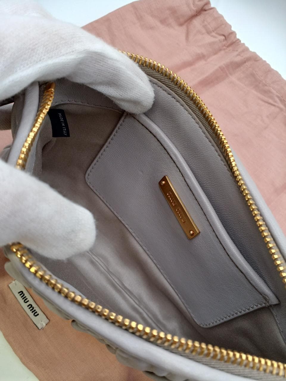 Matelassé clutch bag in greige 6