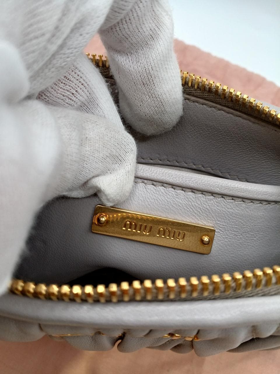 Matelassé clutch bag in greige 7