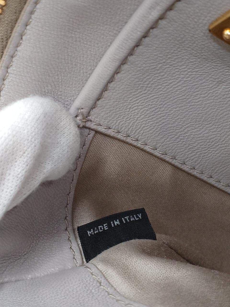 Matelassé clutch bag in greige 8