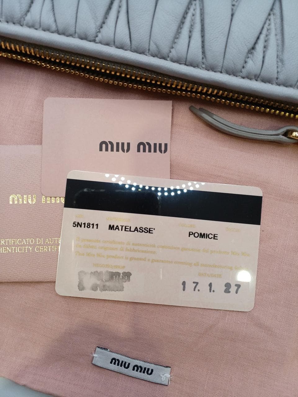 Matelassé clutch bag in greige 13