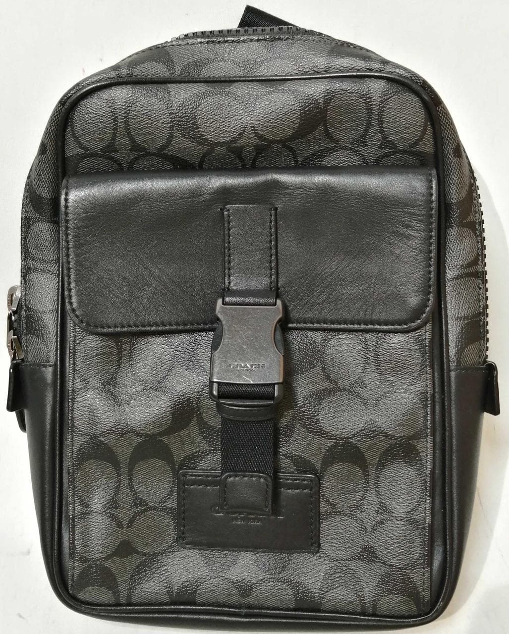 Signature diagonal crossbody bag 2711 with a tear in the mesh part