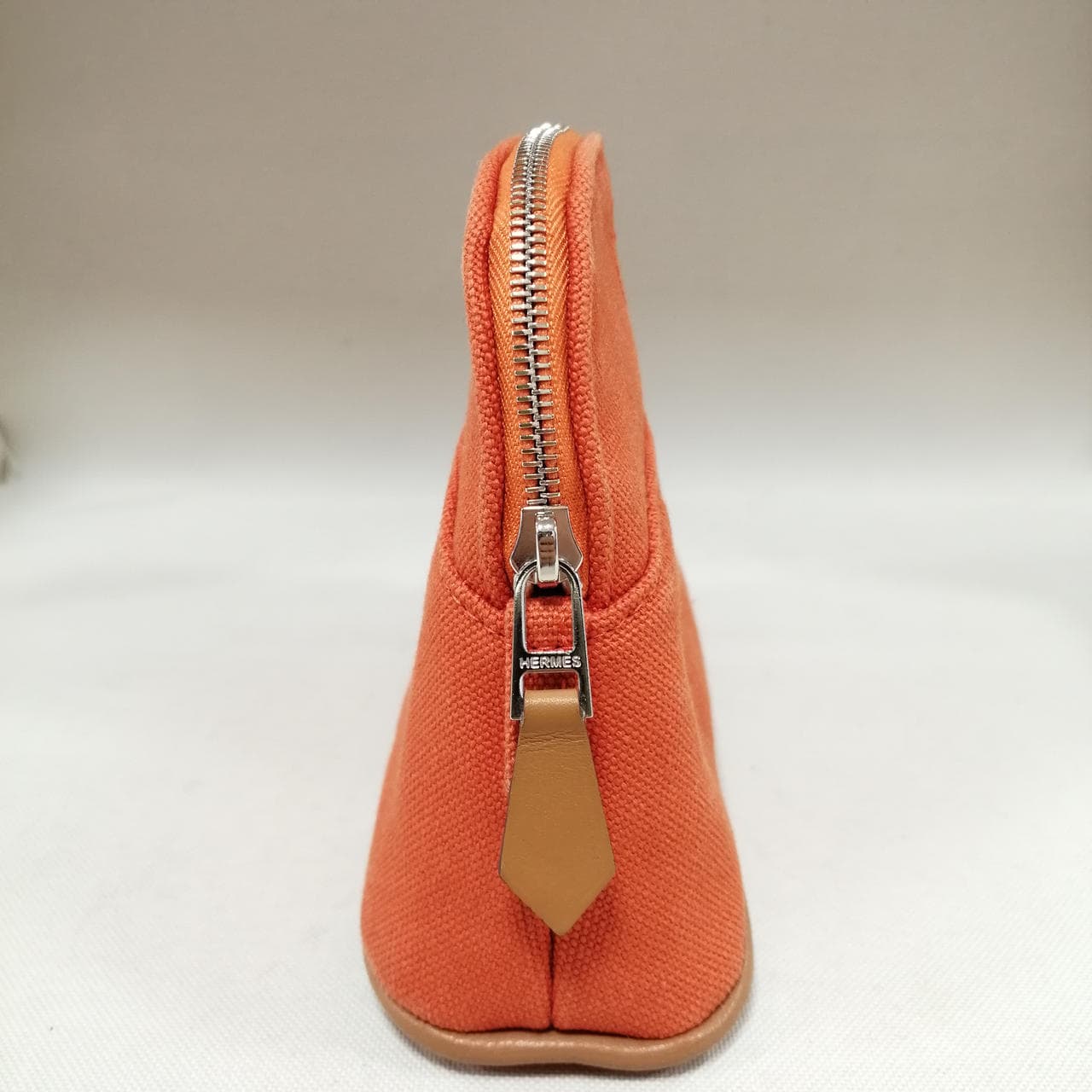 Bolid pouch orange, has dirt on the bottom. 7