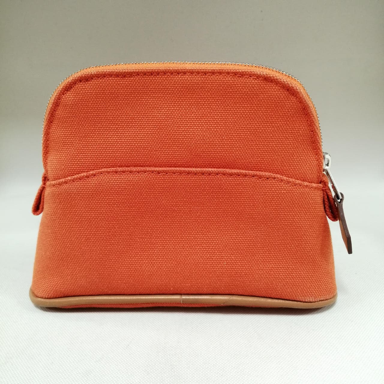 Bolid pouch orange, has dirt on the bottom. 4