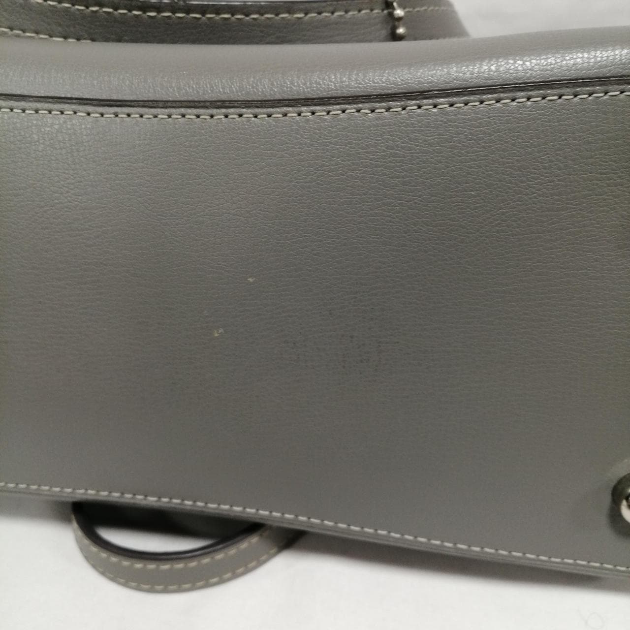 Gray leather handbag 12