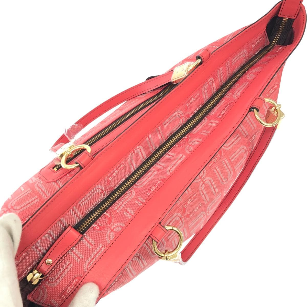 U by Ungaro tote bag in excellent condition, all-over logo/jacquard/coral pink for ladies 6