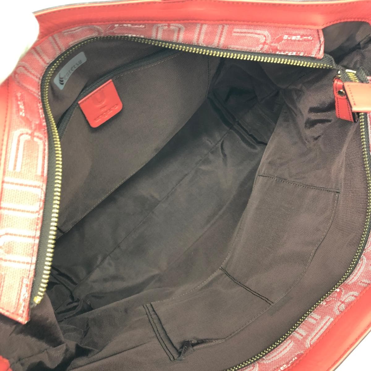 U by Ungaro tote bag in excellent condition, all-over logo/jacquard/coral pink for ladies 7