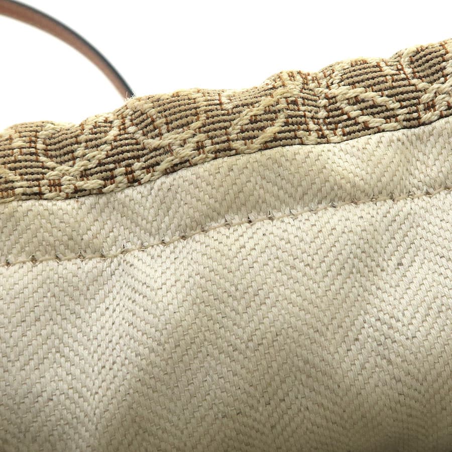 Anagram Pochette Bucket Bag 8