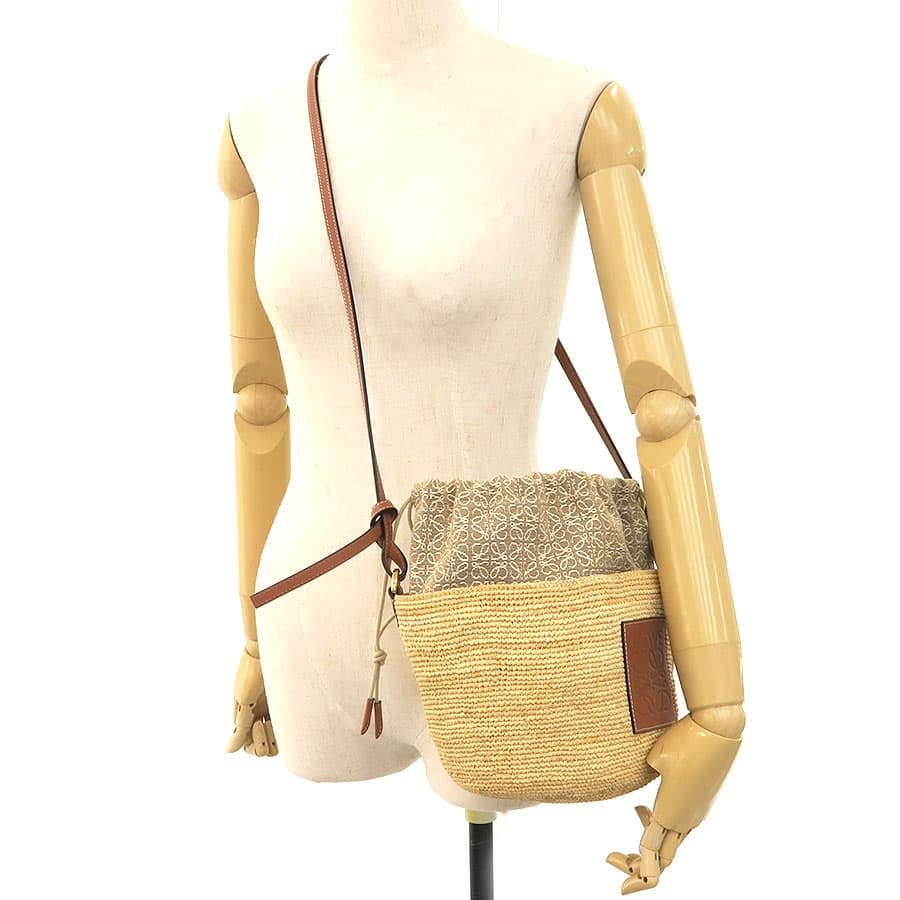 Anagram Pochette Bucket Bag 9